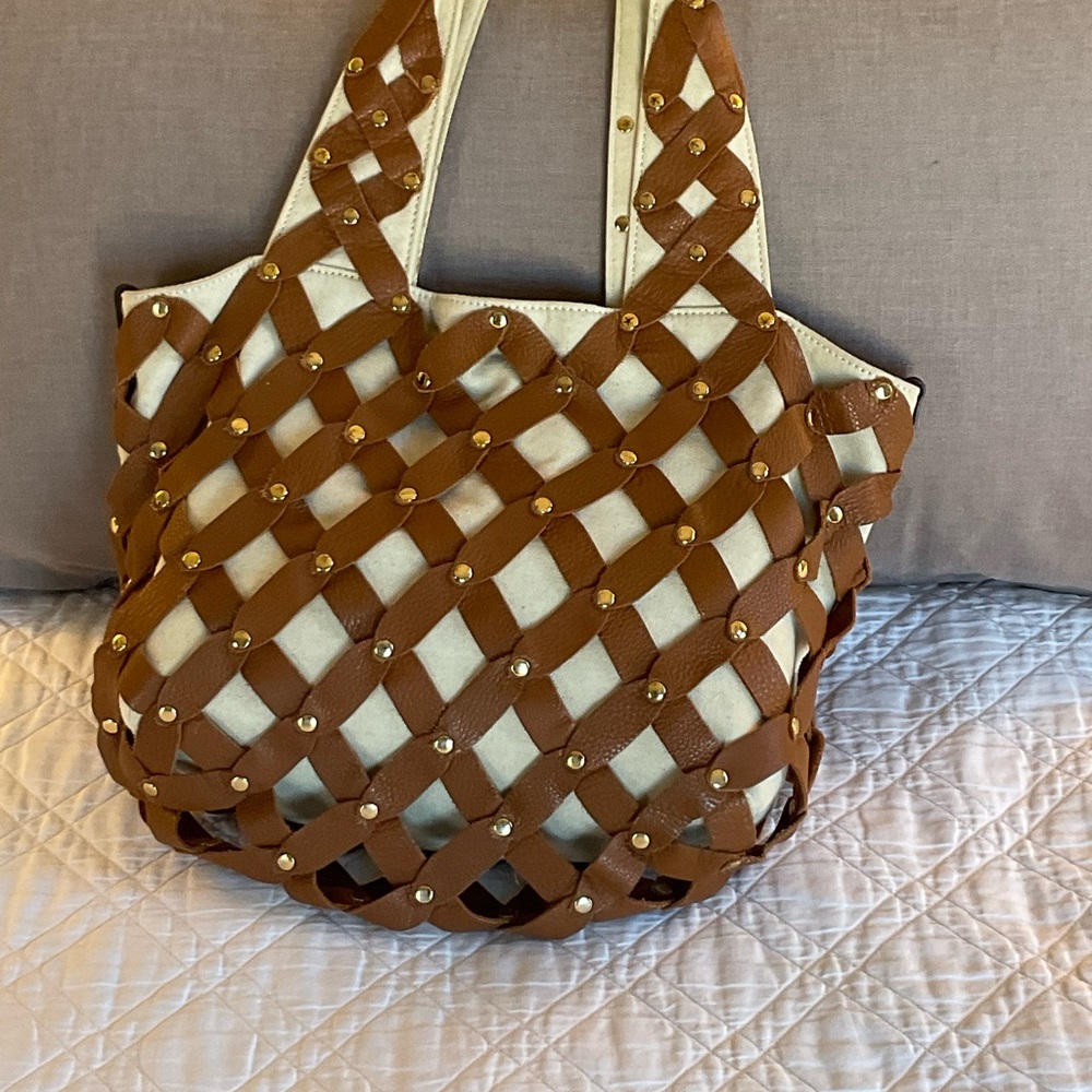 Michael Kors woven basket leather handbag.